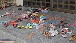 Student's shoes at religious education class